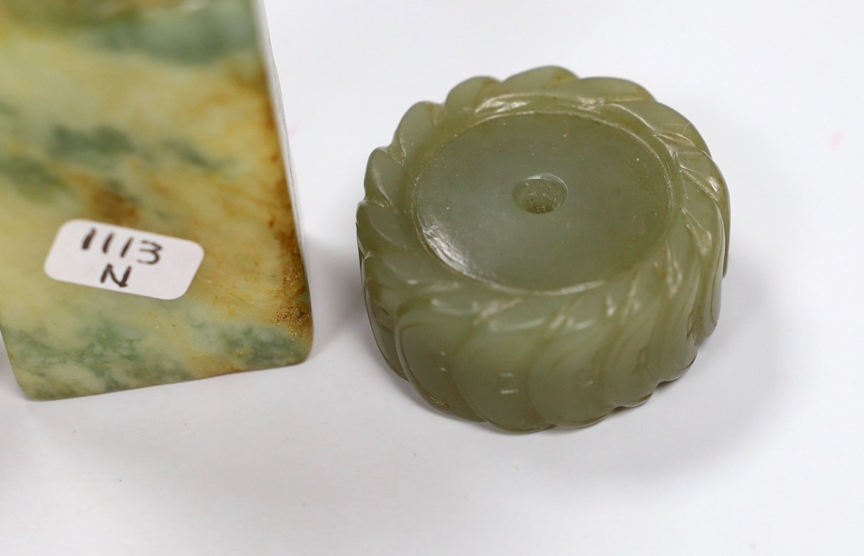 A Chinese green jade 'cash' wheel and a russet jade cicada, a jade pebble carving and a hardstone seal